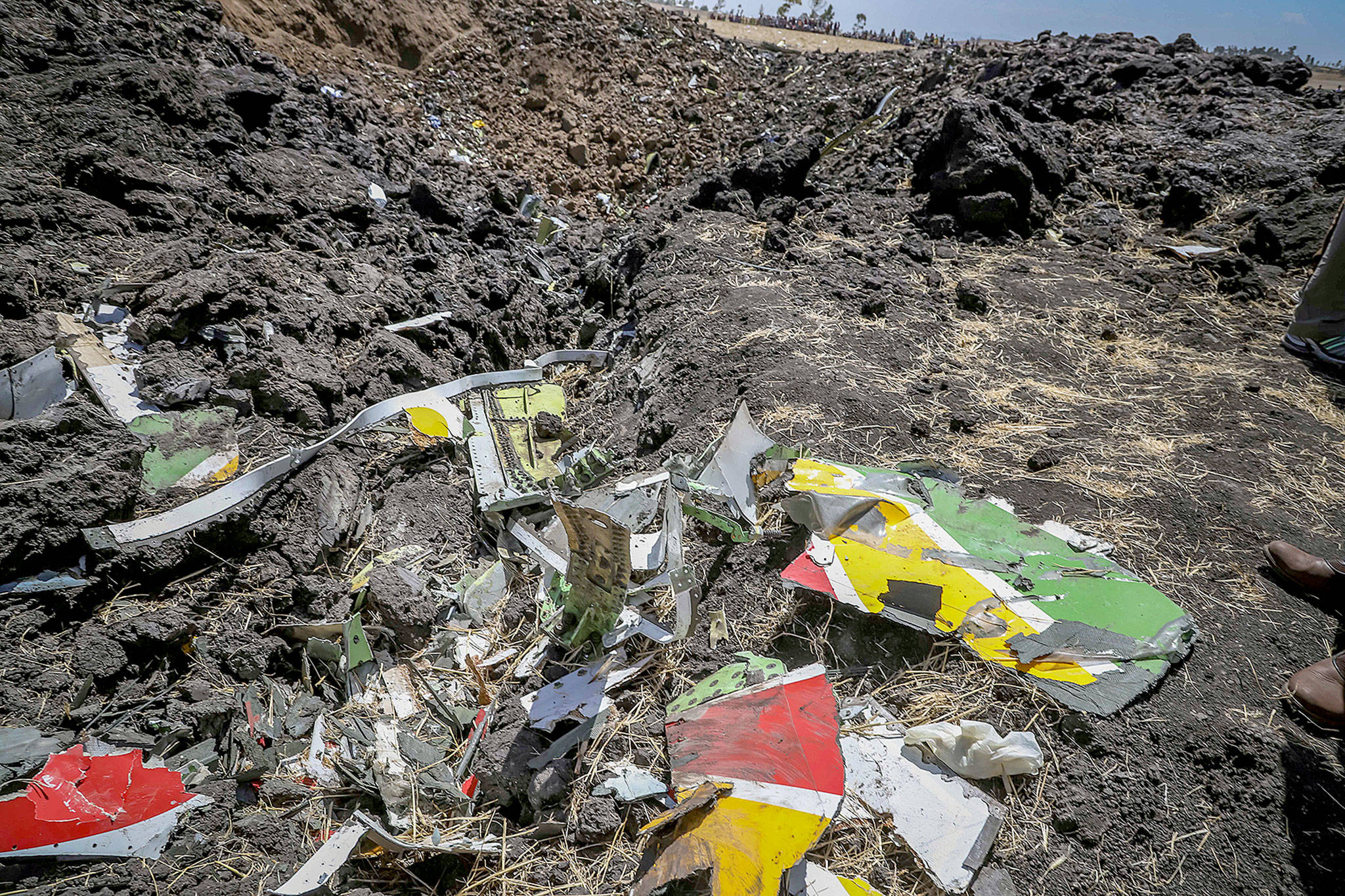 Wreckage at the scene of an Ethiopian Airlines flight that crashed shortly after takeoff south of Addis Ababa, Ethiopia, on Sunday. (AP Photo)
