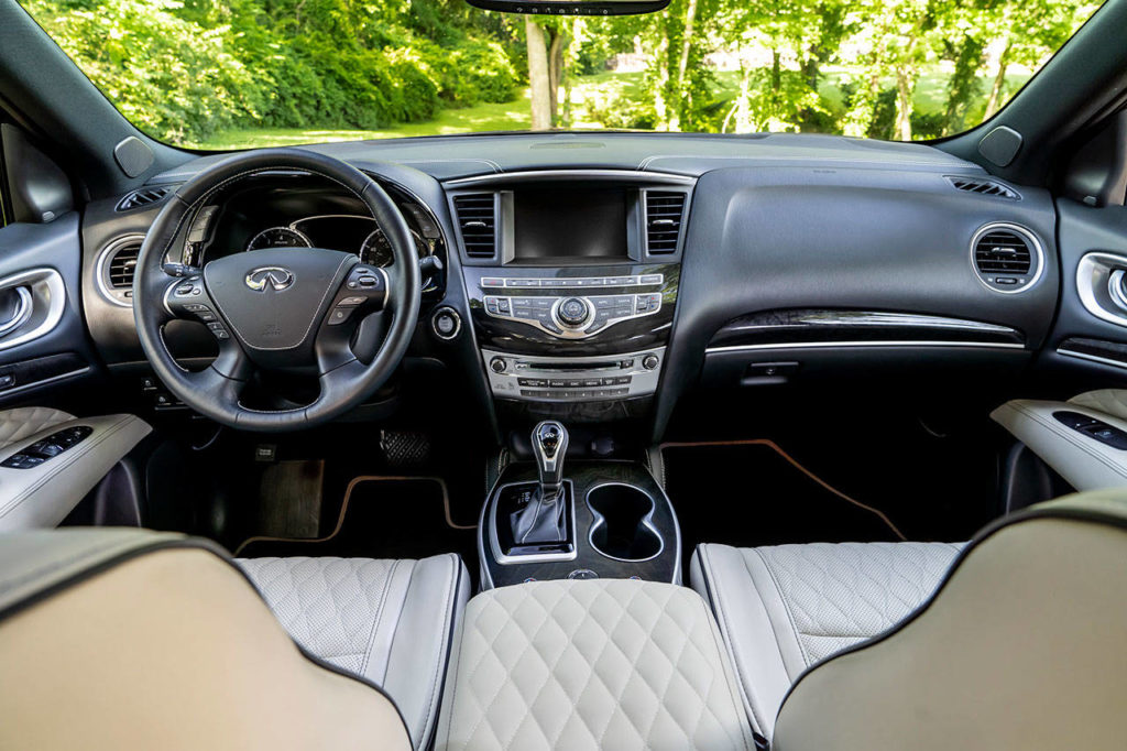 Easy to use controls, including large buttons and knobs for the infotainment and climate control systems, highlight the 2019 Infiniti QX60 interior. (Manufacturer photo)
