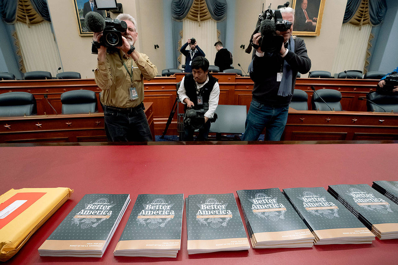 President Donald Trump’s 2020 budget outline arrives on Capitol Hill at the House Budget Committee in Washington Monday morning. (AP Photo/J. Scott Applewhite)