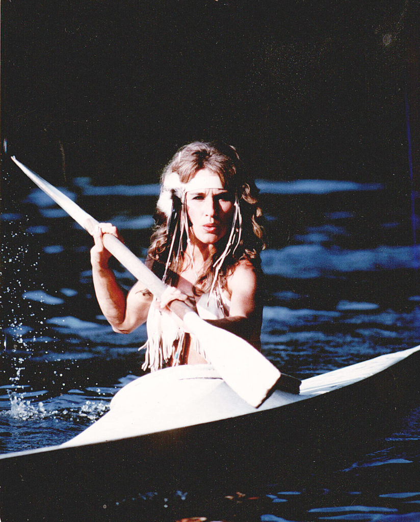 Courtney Bell paddles a kayak in this photo from around 1983. Courtesy L. Lindgren Collection
