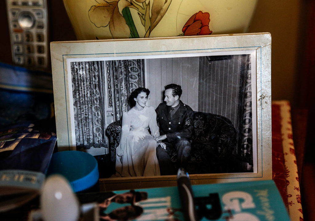 A photo of Ruth May Scougale and her American husband Myron Scougale, taken just days after they were married in Australia in 1944, sits on Ruth’s bedside table at the Josephine home in Stanwood. (Dan Bates / The Herald)
