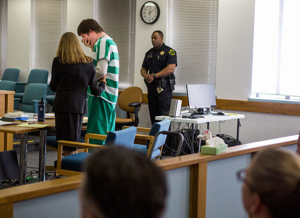 Andrew Henckel cries after he is asked if he would like to speak before Judge Linda Krese at his sentencing on Wednesday, March 20, 2019 in Everett, Wash. (Olivia Vanni / The Herald)

