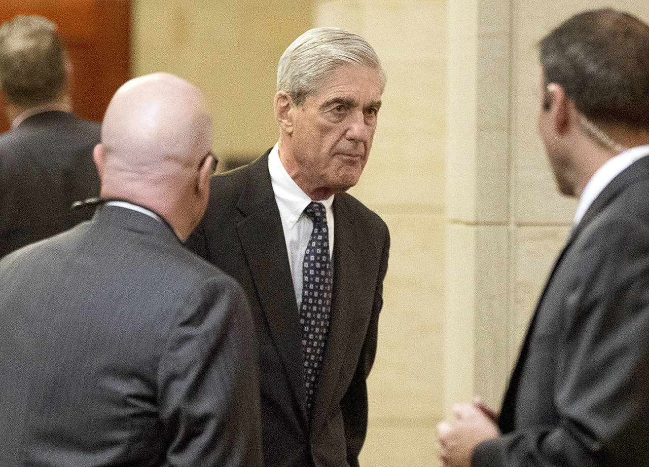 In this June 2017 photo, former FBI Director Robert Mueller, the special counsel probing Russian interference in the 2016 election, arrives on Capitol Hill for a closed door meeting before the Senate Judiciary Committee in Washington. (AP Photo/Andrew Harnik, File)