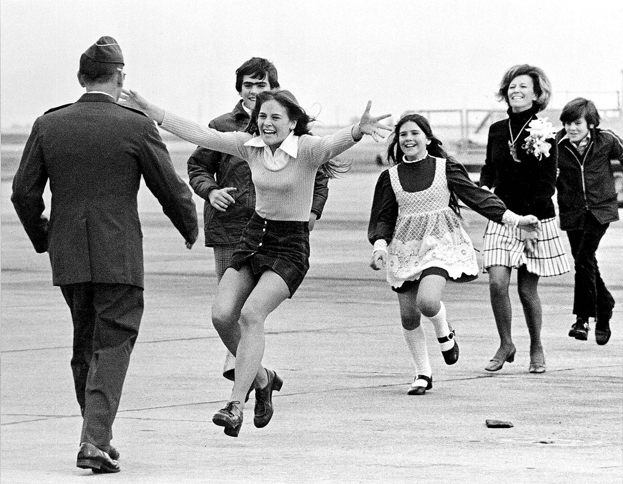 Released prisoner of war Lt. Col. Robert L. Stirm is greeted by his family at Travis Air Force Base in Fairfield, California, as he returns home from the Vietnam War on March 17, 1973. In the lead is Stirm’s daughter Lori, 15; followed by son Robert, 14; daughter Cynthia, 11; wife Loretta and son Roger, 12. Stirm had been imprisoned since 1967. Three days after his homecoming, his wife informed him via a letter that she’d fallen in love with another man and was divorcing him. (Sal Veder / Associated Press)