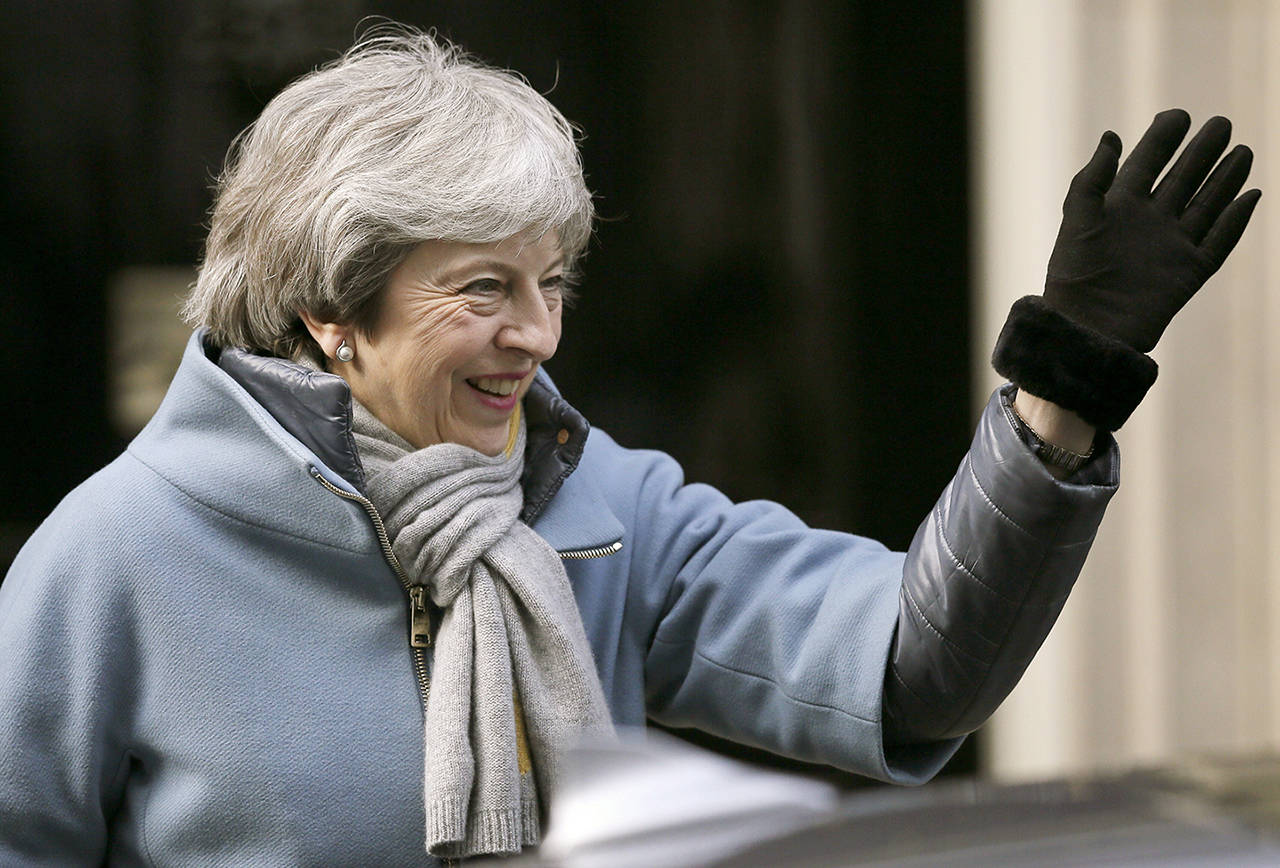 Britain’s Prime Minister Theresa May waves as she leaves 10 Downing street in London on Thursday. (AP Photo/Tim Ireland)