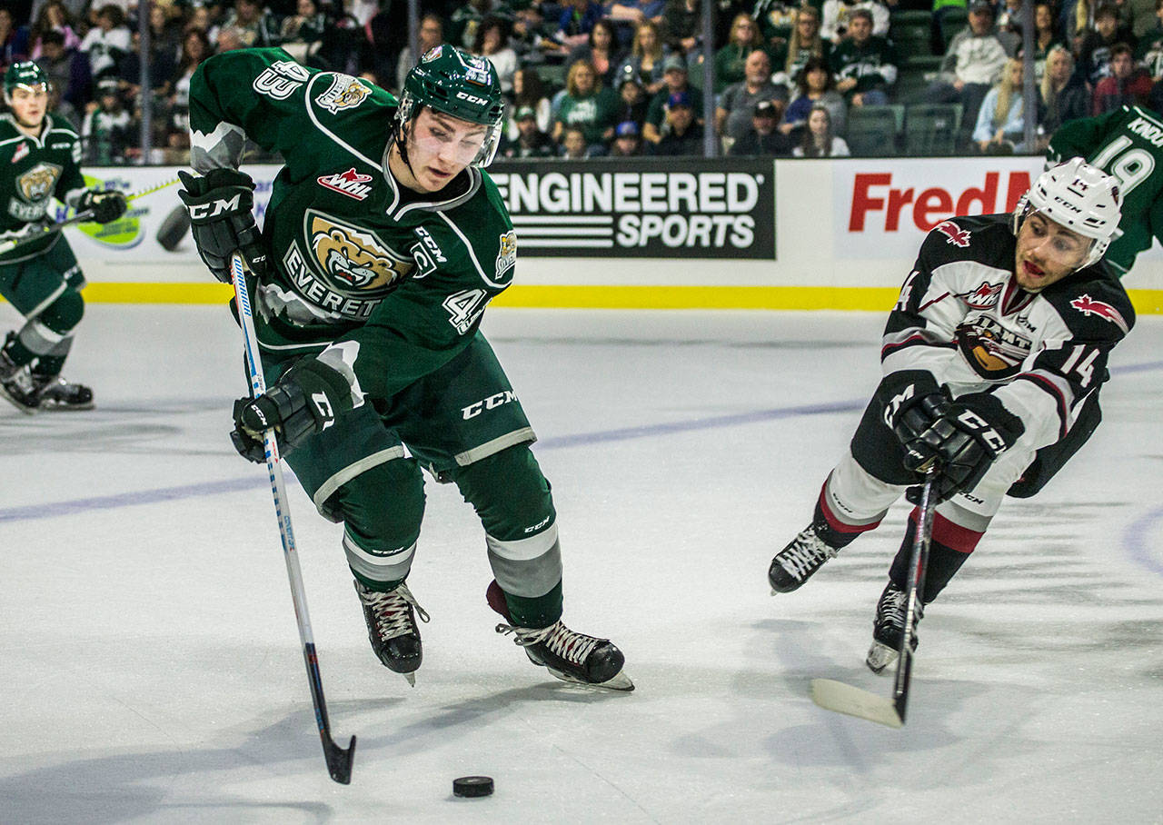 The Silvertips’ Connor Dewar skates with the puck during a game against the Vancouver Giants on Sept. 22, 2018, in Everett. (Olivia Vanni / The Herald)