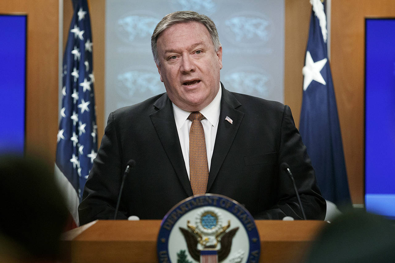 Secretary of State Mike Pompeo speaks during a news conference at the State Department on Friday in Washington. (AP Photo/Carolyn Kaster)