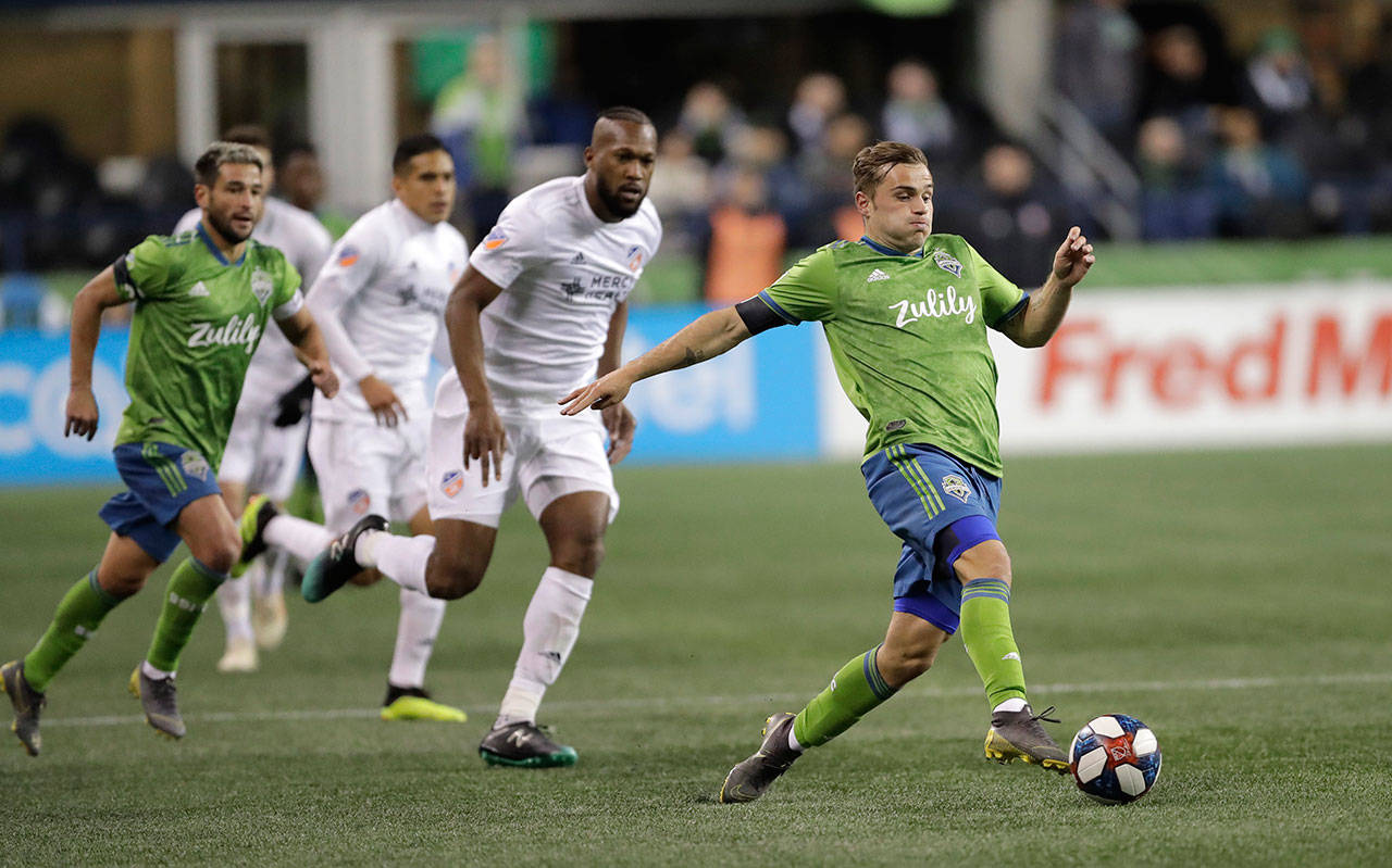 Sounders forward Jordan Morris moves the ball during the second half of an MLS match against FC Cincinnati on March 2, 2019, in Seattle. The Sounders won 4-1. (AP Photo/Ted S. Warren)
