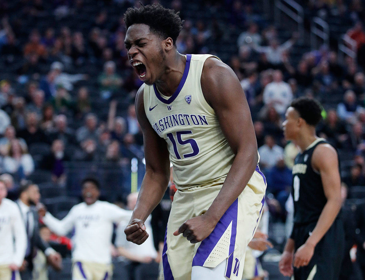 Washington’s Noah Dickerson celebrates after a play against Colorado during the second half of Pac-12 tournament semifinal on March 15, 2019, in Las Vegas. (AP Photo/John Locher)
