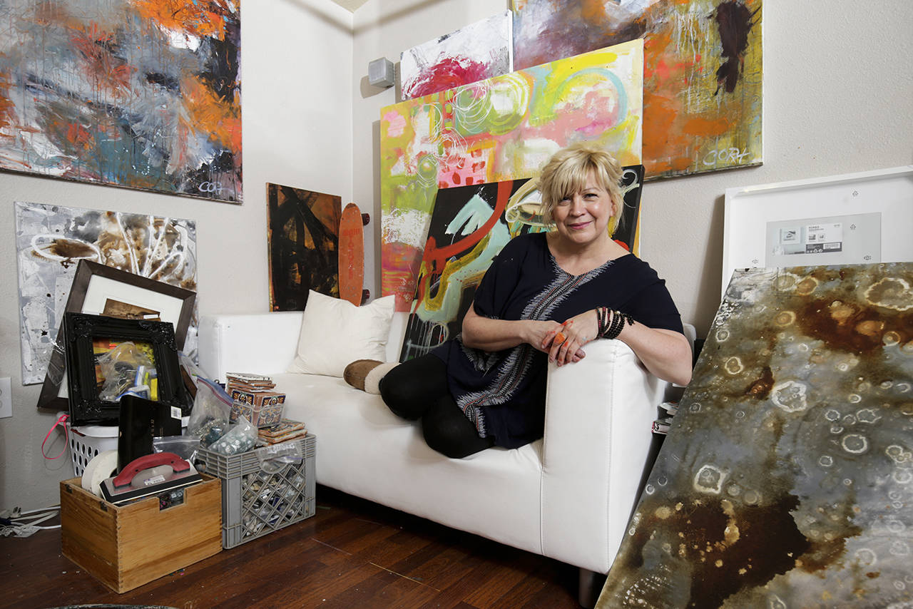 Jackie Cort works in a cozy studio behind her home in Snohomish. (Andy Bronson / The Herald)