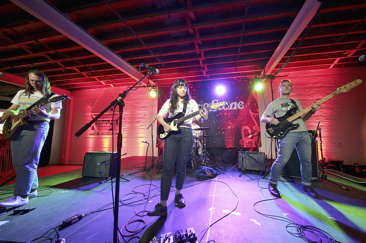 From left, Jonathan Pearce, Elizabeth Stokes, and Benjamin Sinclair of The Beths perform during the 2019 SXSW Conference and Festivals in Austin, Texas. (SXSW)