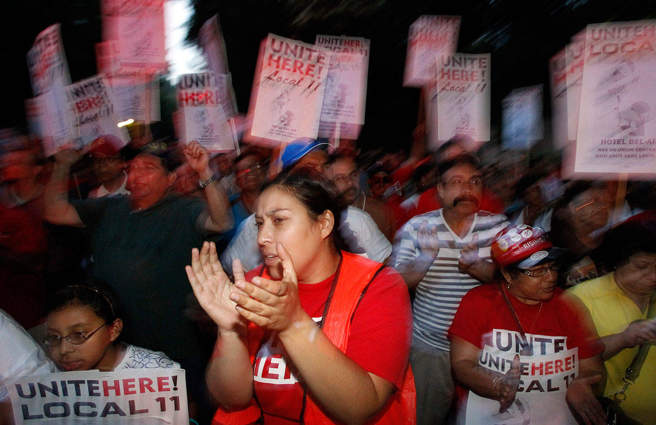 Unite Here union members protest the reopening of the Bel-Air Hotel after a two-year renovation on Oct. 14, 2011. The union members protested that the workers were not rehired after the temporary closure. (Luis Sinco/Los Angeles Times/TNS)