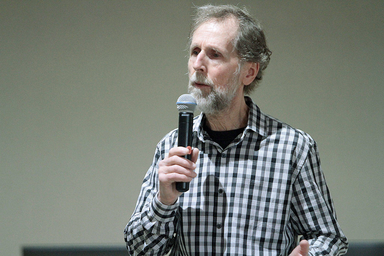 Councilman Ron Peltier talks about ethics complaints at a ward meeting earlier this year. (Brian Kelly / Bainbridge Island Review)