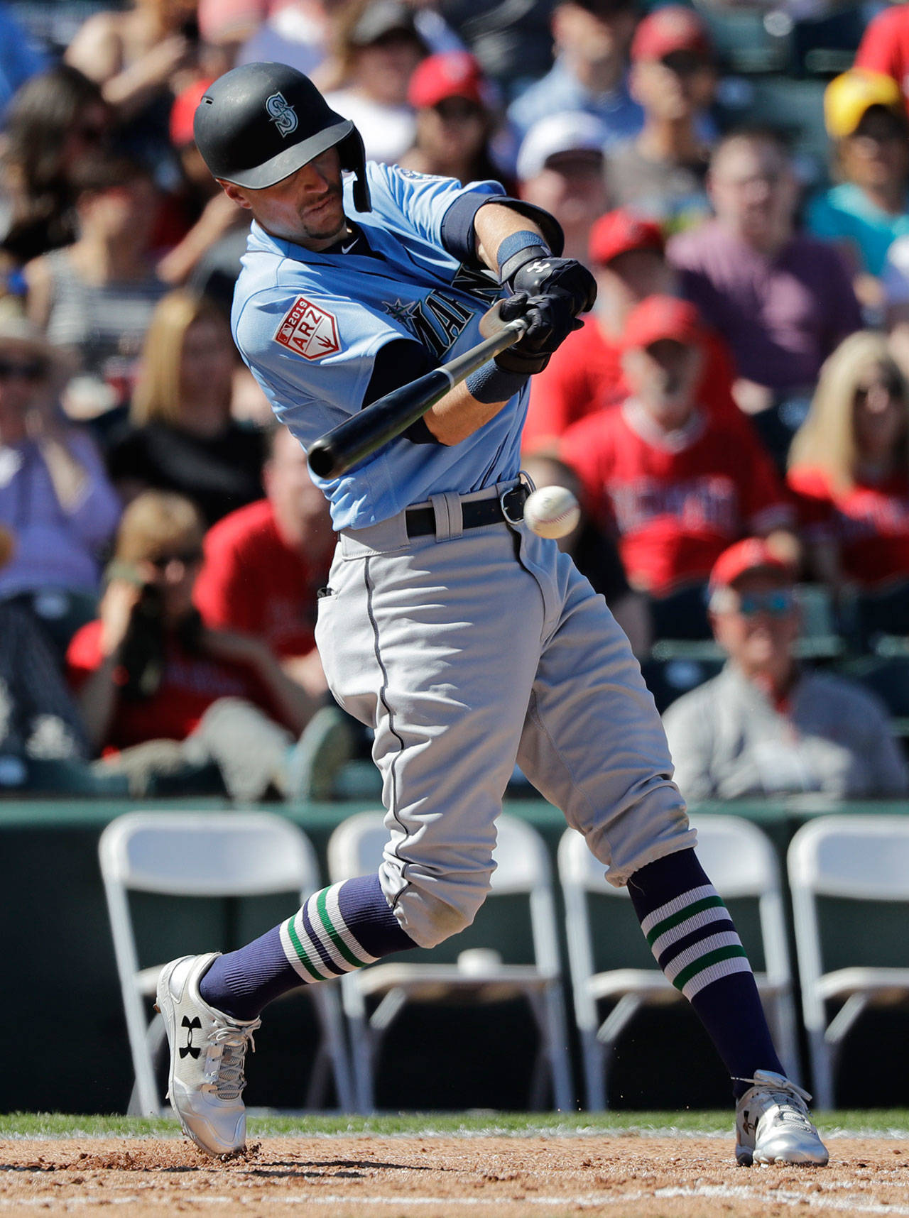 Mariners outfielder Braden Bishop bats during a spring game against the Angels on March 10, 2019, in Tempe, Ariz. (AP Photo/Elaine Thompson)