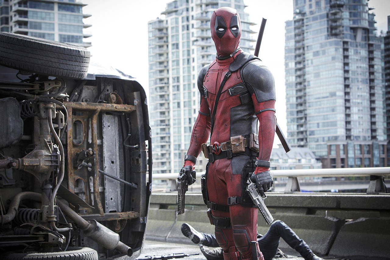 This image shows Ryan Reynolds in a scene from the film, “Deadpool.” When Walt Disney Co.’s $71.3 billion acquisition of Fox is completed, Disney will add the R-rated superhero Deadpool, the X-Men and the Fantastic Four to its bench of Marvel characters. (Joe Lederer/Twentieth Century Fox Film Corp. via AP)