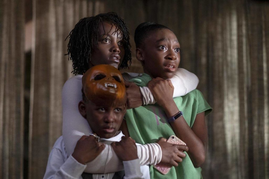 Evan Alex, Lupita Nyong’o and Shahadi Wright Joseph in a spooky moment in “Us.” (Universal Pictures)
