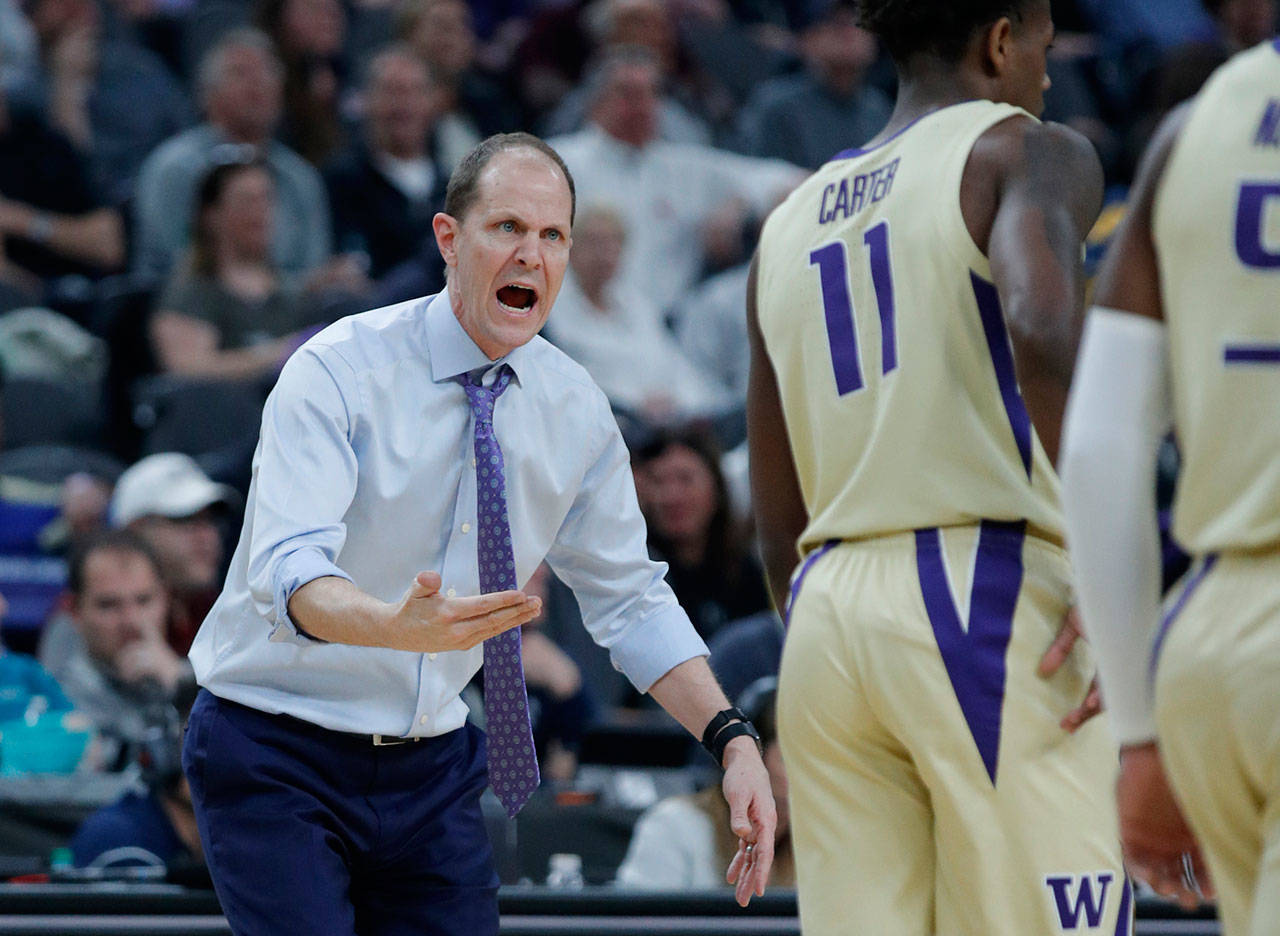 Washington men’s basketball coach Mike Hopkins reacts during the first half of his team’s game against Colorado on Friday in Las Vegas. (AP Photo/John Locher)