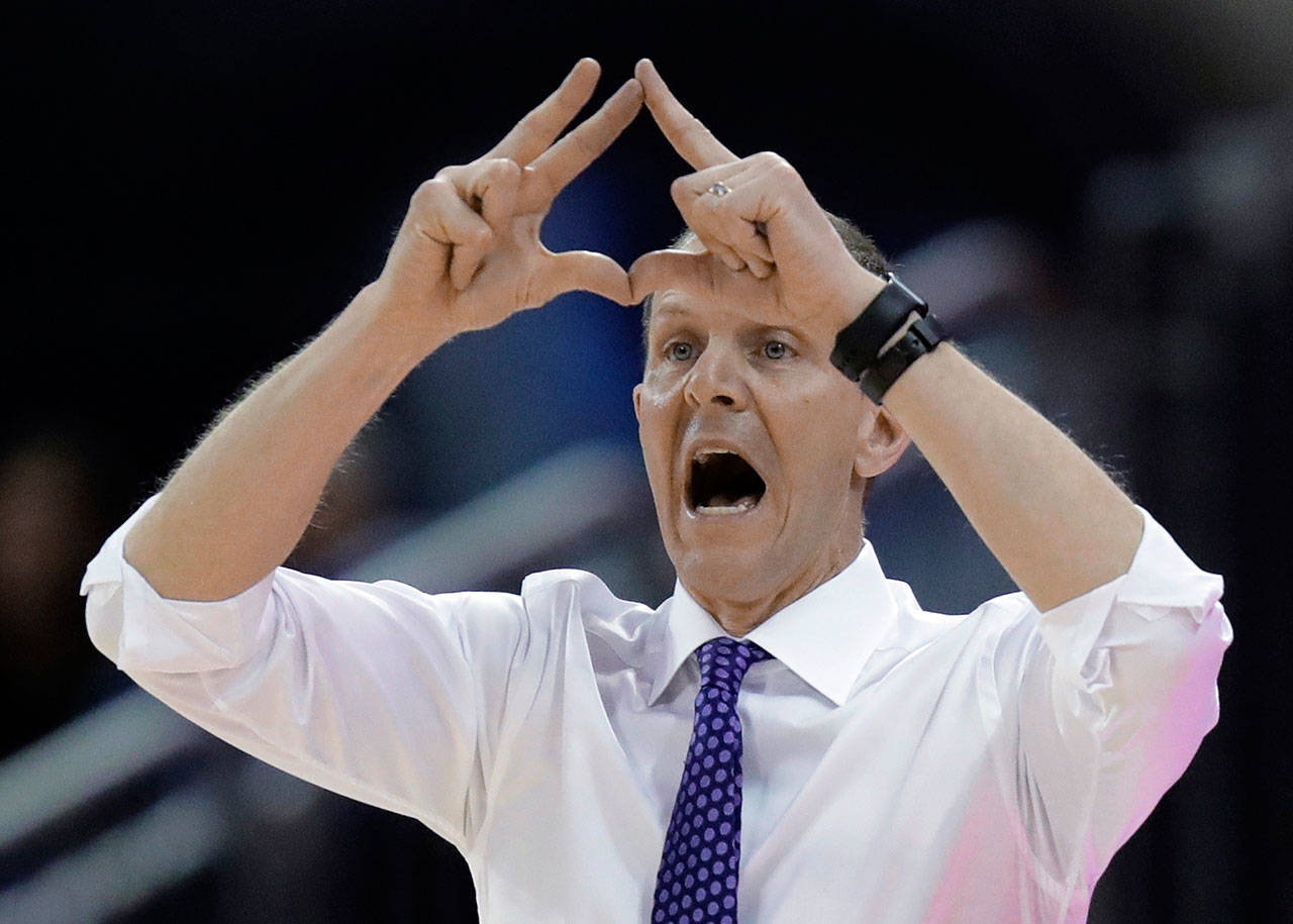 Washington coach Mike Hopkins signals to his team during the first half of a game against Oregon State on March 6, 2019, in Seattle. (AP Photo/Ted S. Warren)