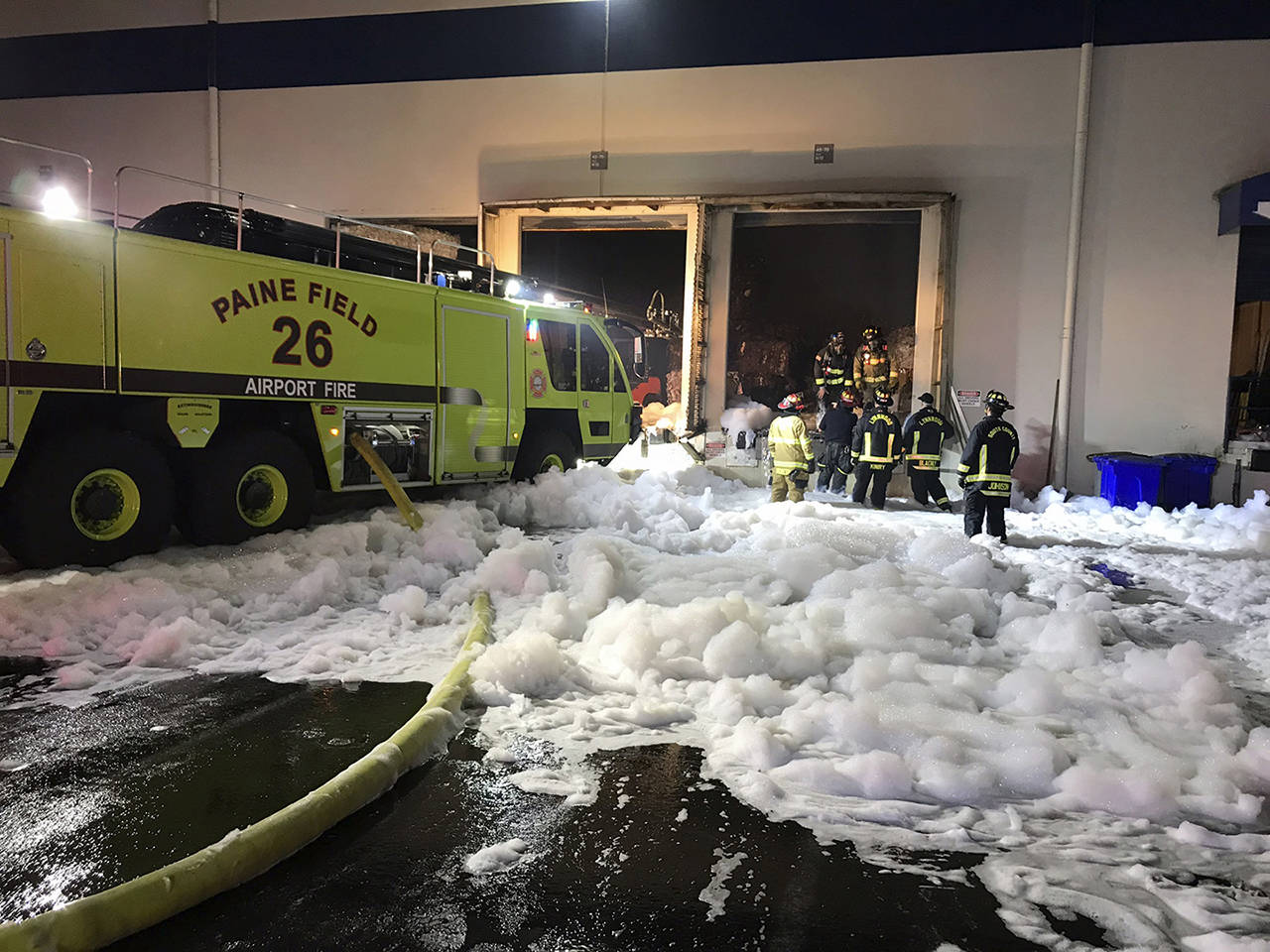 Firefighters were able to keep damage from a fire at a paper recycling warehouse near Paine Field to a minimum, officials said. (South County Fire)