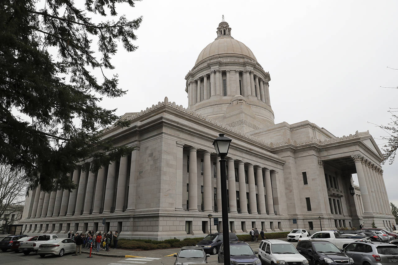 House Democrats unveiled a two-year state budget proposal Monday that seeks $1.4 billion in new revenue, including a new capital gains tax on the sale of high-value stocks and bonds. (AP Photo/Ted S. Warren)