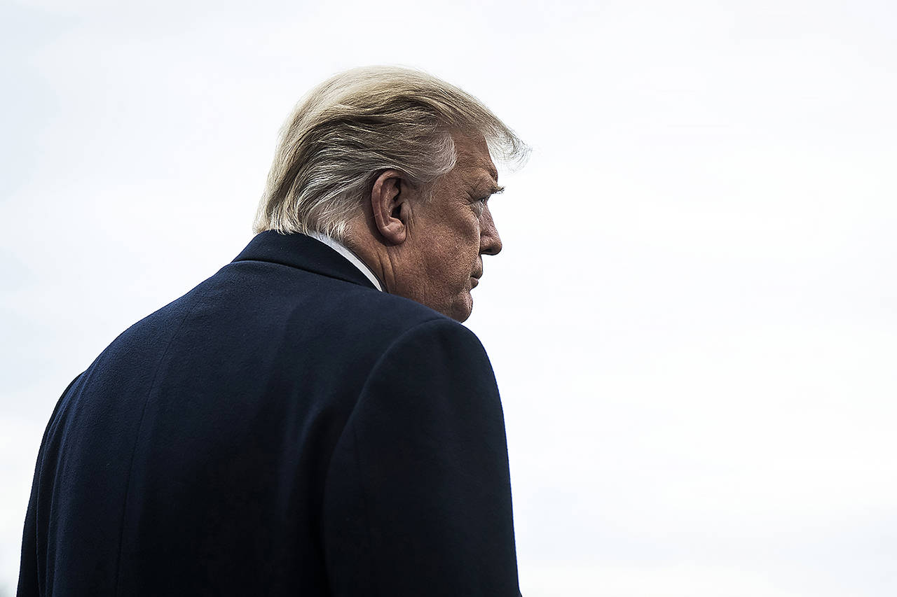 President Donald J. Trump stops to talk to reporters and members of the media as he walks to Marine One to depart from the South Lawn at the White House on Fridayin Washington. (Jabin Botsford/Washington Post)