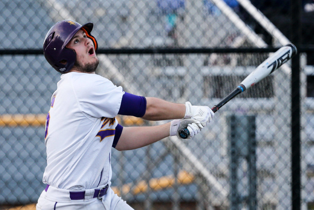 Lake Stevens’ Theron Perkins bats against Meadowdale at Lake Stevens High School on March 21, 2019. (Kevin Clark / The Herald)
