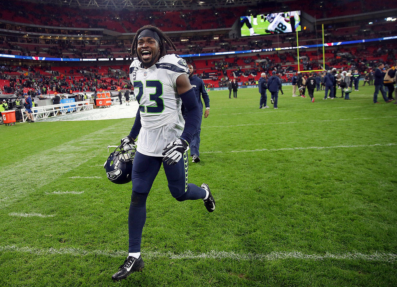 Seattle Seahawks defensive back Neiko Thorpe celebrates after a game at Wembley stadium in London on Oct. 14, 2018. (Tim Ireland / Associated Press)
