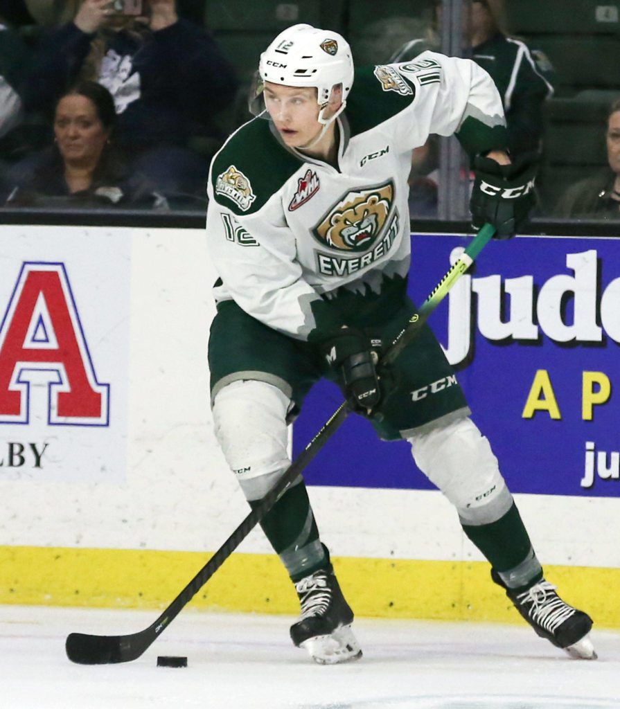 The Silvertips’ Max Patterson controls the puck during Game 2 of a first-round playoff series against Tri-City on March 23, 2019, at Angel of the Winds Arena in Everett. (Kevin Clark / The Herald)
