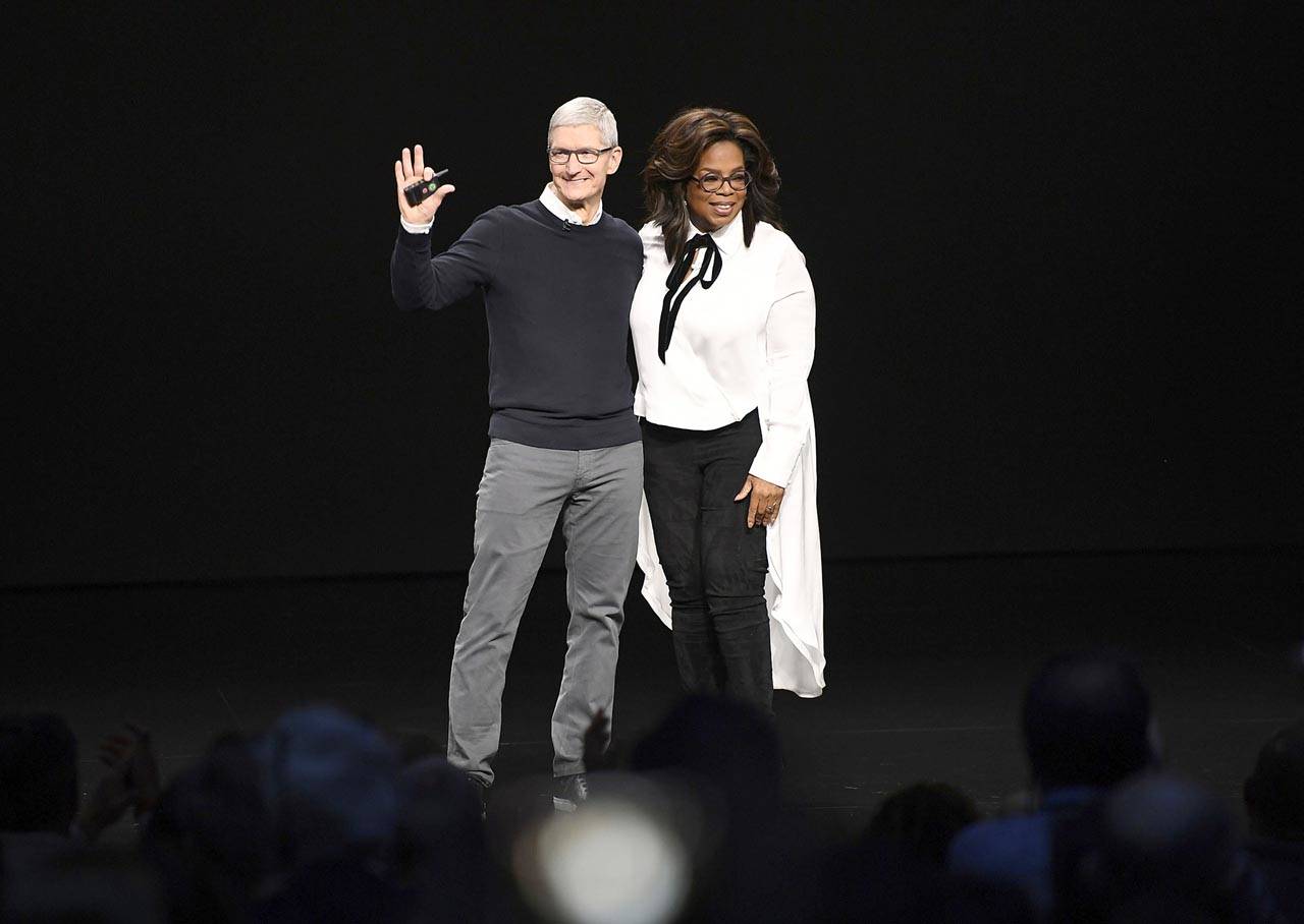 A parade of celebrities including Oprah Winfrey joined Apple CEO Tim Cook onstage Monday to promote the tech giant’s video-streaming service. (Bloomberg)