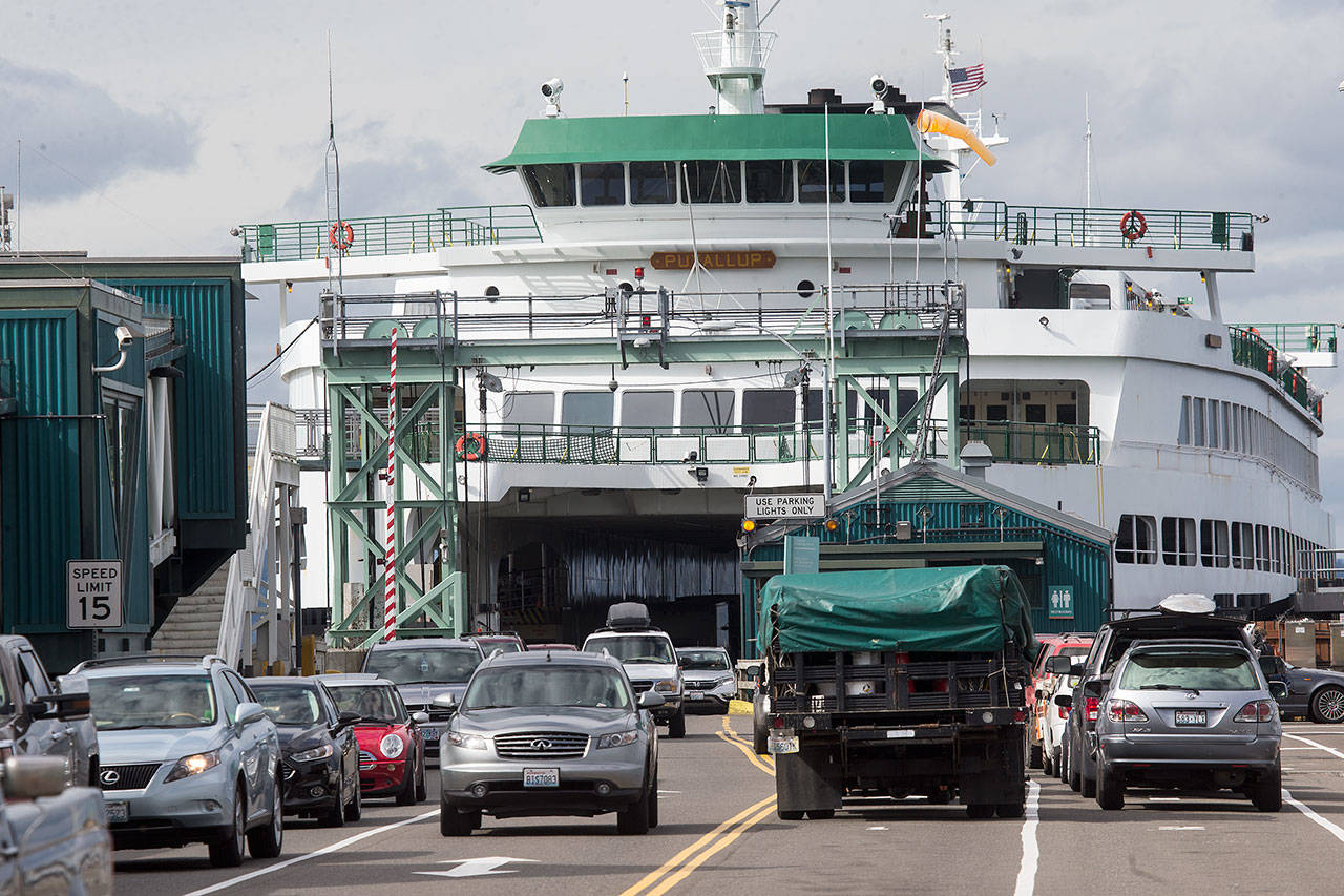 The MV Puyallup offloads at the Edmonds Ferry Terminal on Sept. 21, 2018 in Edmonds. Under a budget proposal from House Democrats, ferry fares would rise. (Andy Bronson / The Herald)