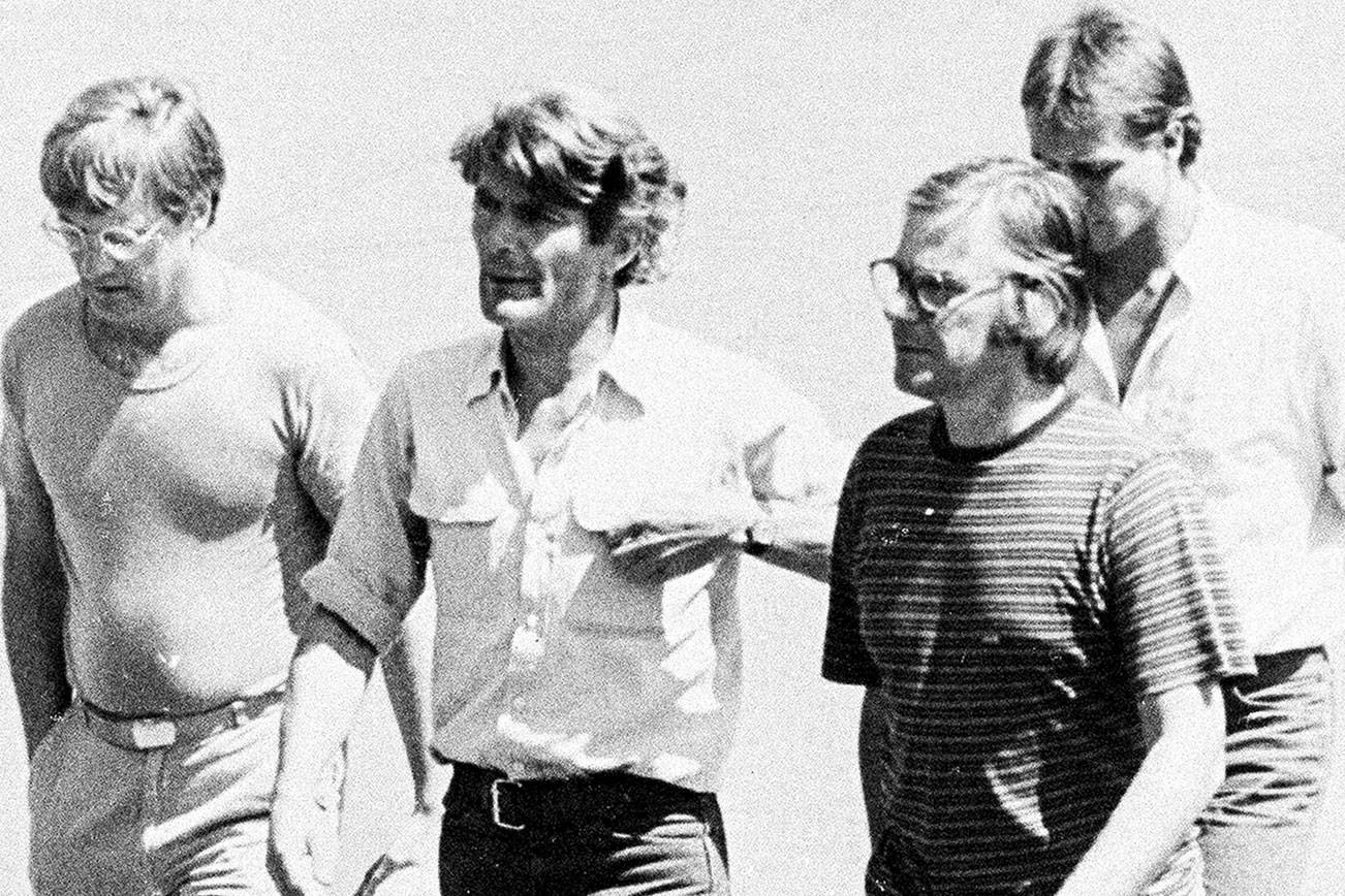 In this March 11, 1982 photo, from left, Jan Cornelius Kuiper, director, Koos Koster, producer, Johannes Willemsen, cameraman, and Hans ter Laan, soundman walk north of the capital, San Salvador, days before they were killed in El Salvador. Calls are mounting for Col. Mario Reyes Mena, a former Salvadoran army colonel, to be brought to justice for the killings. (AP Photo)