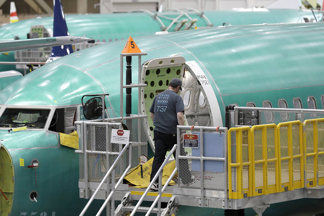 A Boeing 737 MAX 8 airplane is shown on the assembly line during a brief media tour of Boeing’s 737 assembly facility, Wednesday in Renton. (AP Photo/Ted S. Warren)
