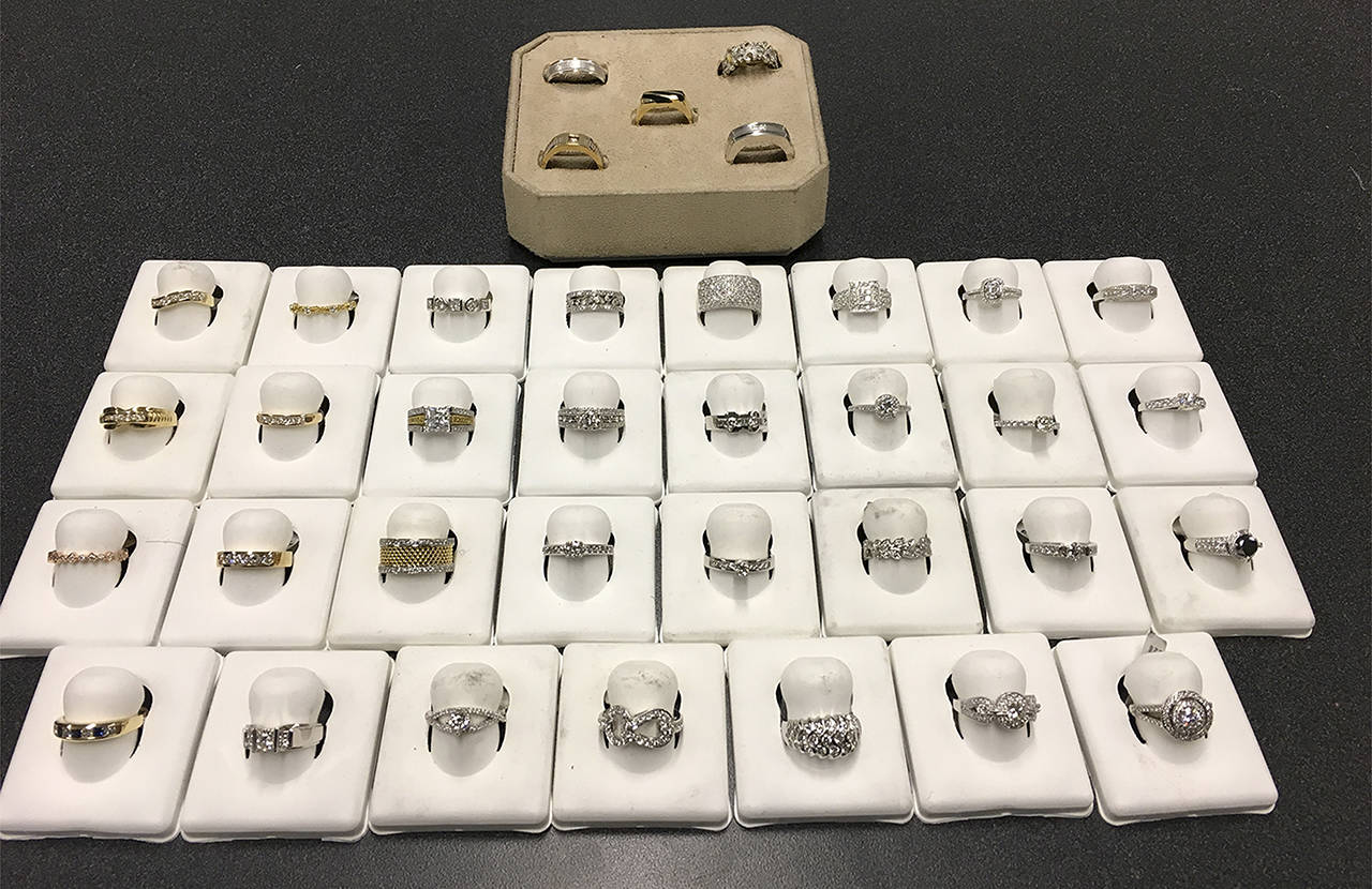 Multiple rings were found at the suspect’s home. (Bellevue Police Department)
