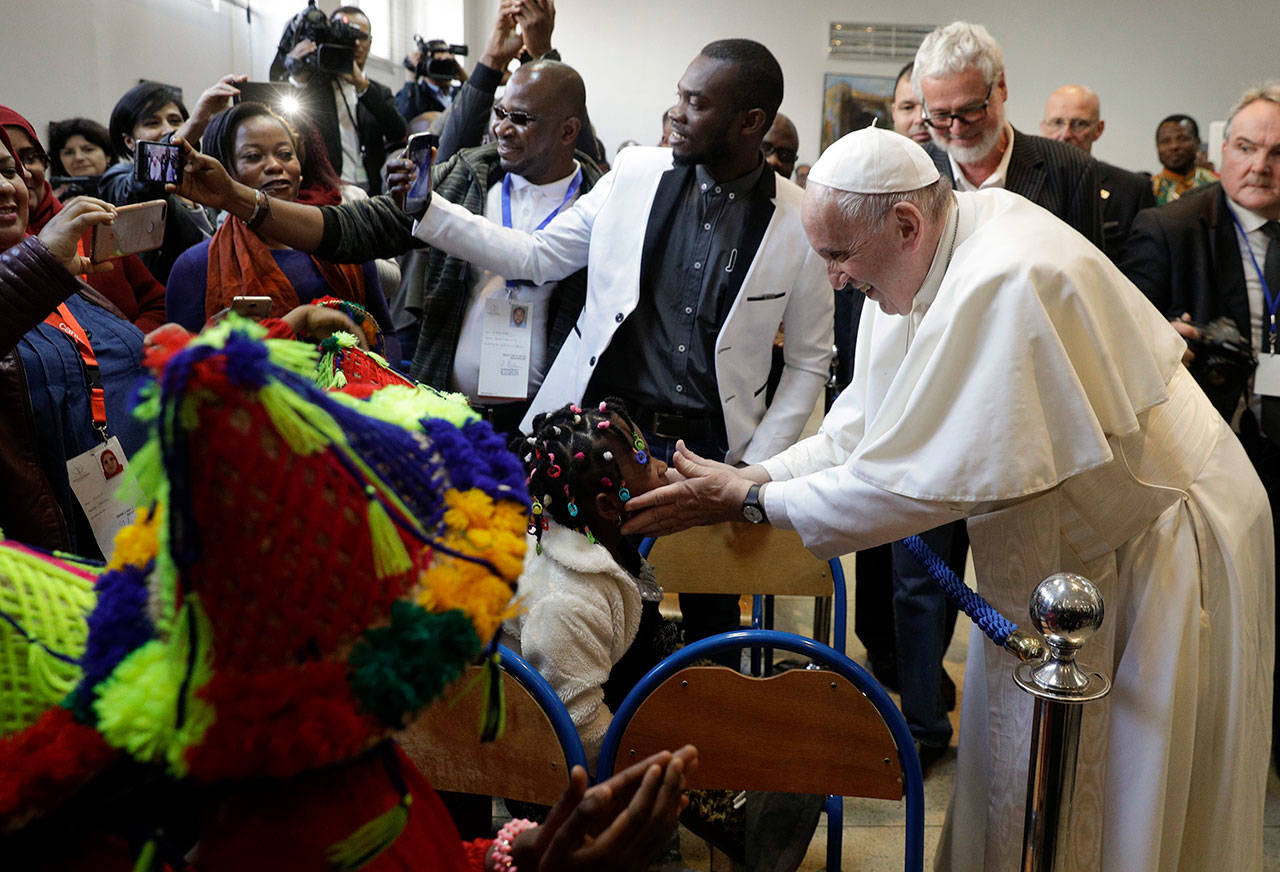 Pope Francis meets migrants at the diocesan Caritas center in Rabat, Morocco on Saturday. (AP Photo/Gregorio Borgia)