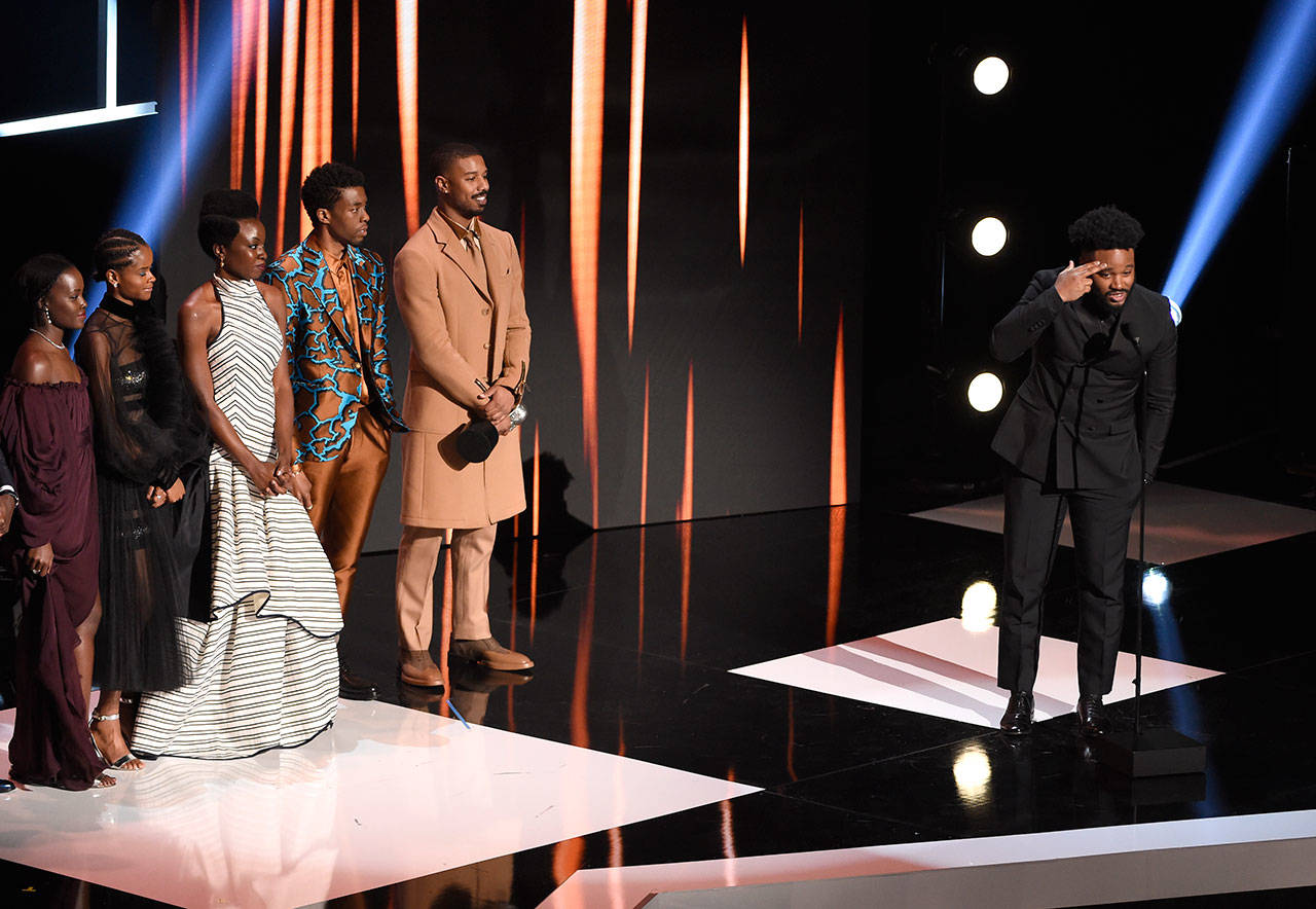 Ryan Coogler (right) and the cast of “Black Panther” accept the award for outstanding motion picture at the 50th annual NAACP Image Awards on Saturday at the Dolby Theatre in Los Angeles. (Photo by Chris Pizzello/Invision/AP)