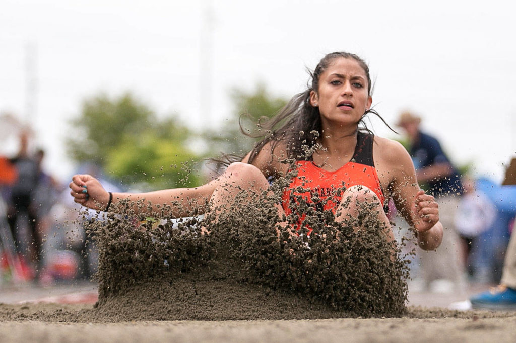 As a freshman last season, Monroe’s Hannah Ganashamoorthy posted a mark of 20 feet, 2 inches in the long jump, which ranked 16th in the nation. (Kevin Clark / The Herald)
