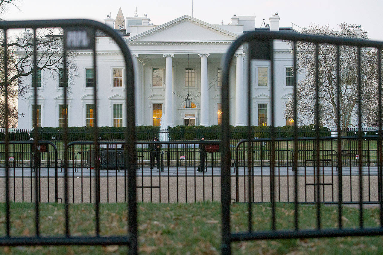 The White House in Washington last month. A White House official turned whistleblower says dozens of people in President Donald Trump’s administration were granted access to classified information despite “disqualifying issues” in their backgrounds including concerns about foreign influence, drug use and criminal conduct. (AP Photo/Cliff Owen)