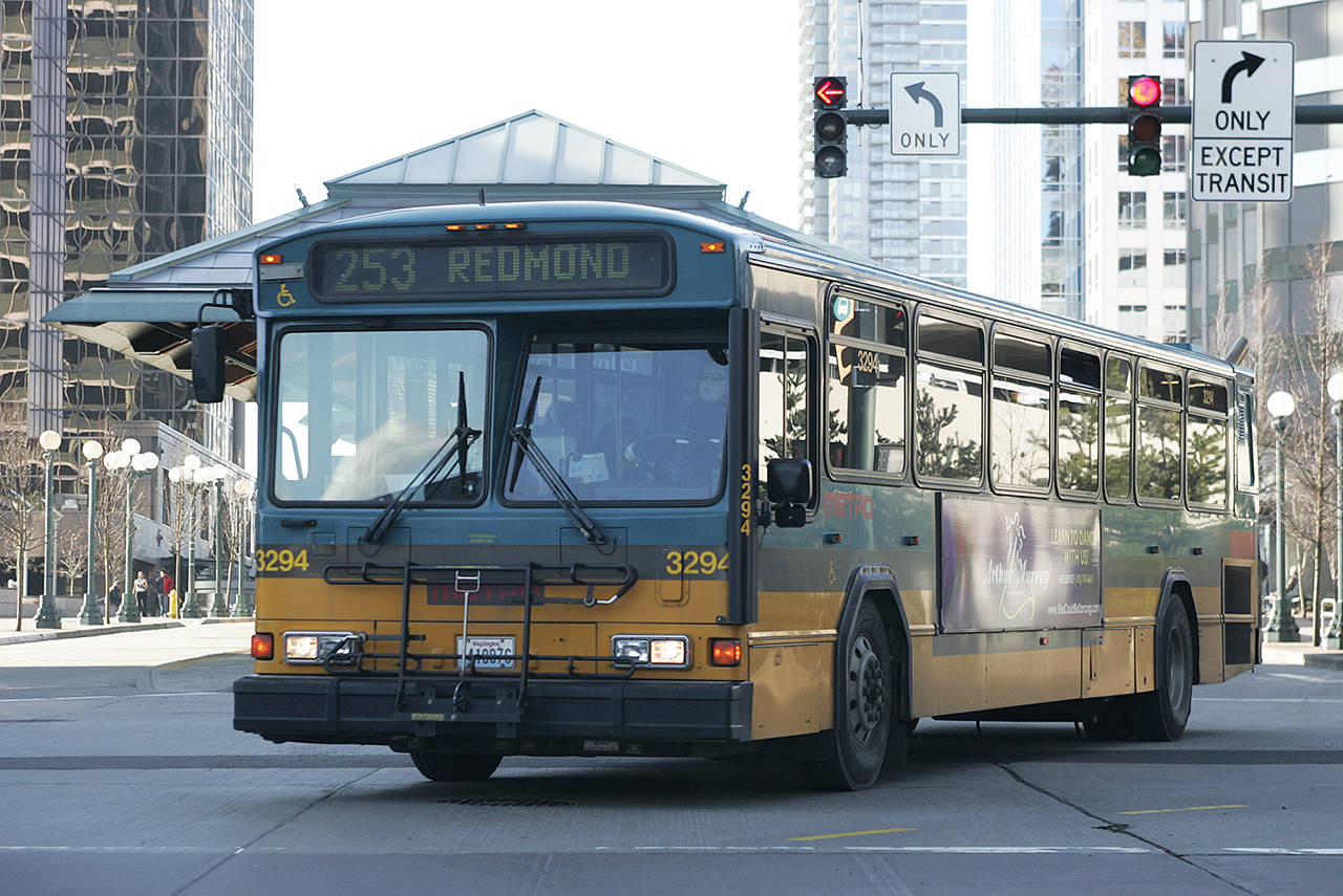 A Metro bus pulls out of the Bellevue Transit Center on Feb. 18. (Fumiko Yarita / Bellevue Reporter, file)