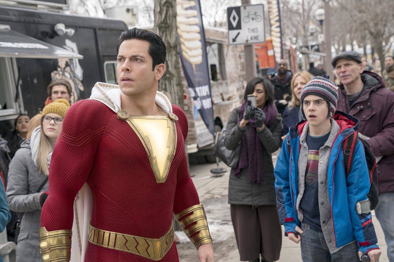 Zachary Levi, left, and Jack Dylan Grazer fight for justice in “Shazam!” (Warner Bros. Entertainment)