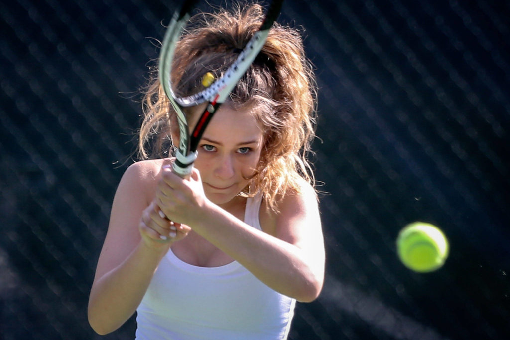 After placing at state last year as a freshman, Kate Ivens has won all 14 sets this season as Shorecrest’s No. 1 singles player. (Kevin Clark / The Herald)

