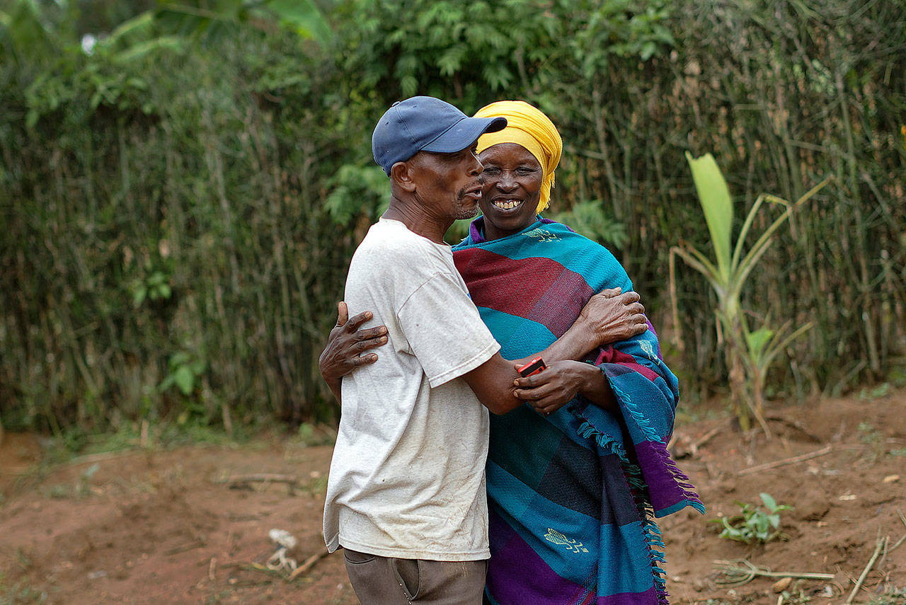 Genocide survivor Laurencia Mukalemera (right), a Tutsi, greets Tasian Nkundiye, a Hutu who murdered her husband and spent eight years in prison for the killing and other crimes, at Nkundiye’s home in the reconciliation village of Mbyo, near Nyamata, in Rwanda, on April 4. Twenty-five years after the genocide the country has six “reconciliation villages” where convicted perpetrators who have been released from prison after publicly apologizing for their crimes live side by side with genocide survivors who have professed forgiveness. (AP Photo/Ben Curtis)