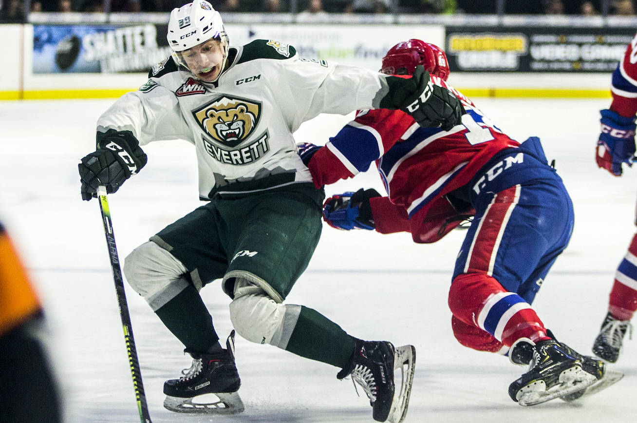 The Everett Silvertips’ Gage Gonclaves escapes a hit during the game against the Spokane Chiefs on Saturday, April 6, 2019 in Everett, Wash. (Olivia Vanni / The Herald)