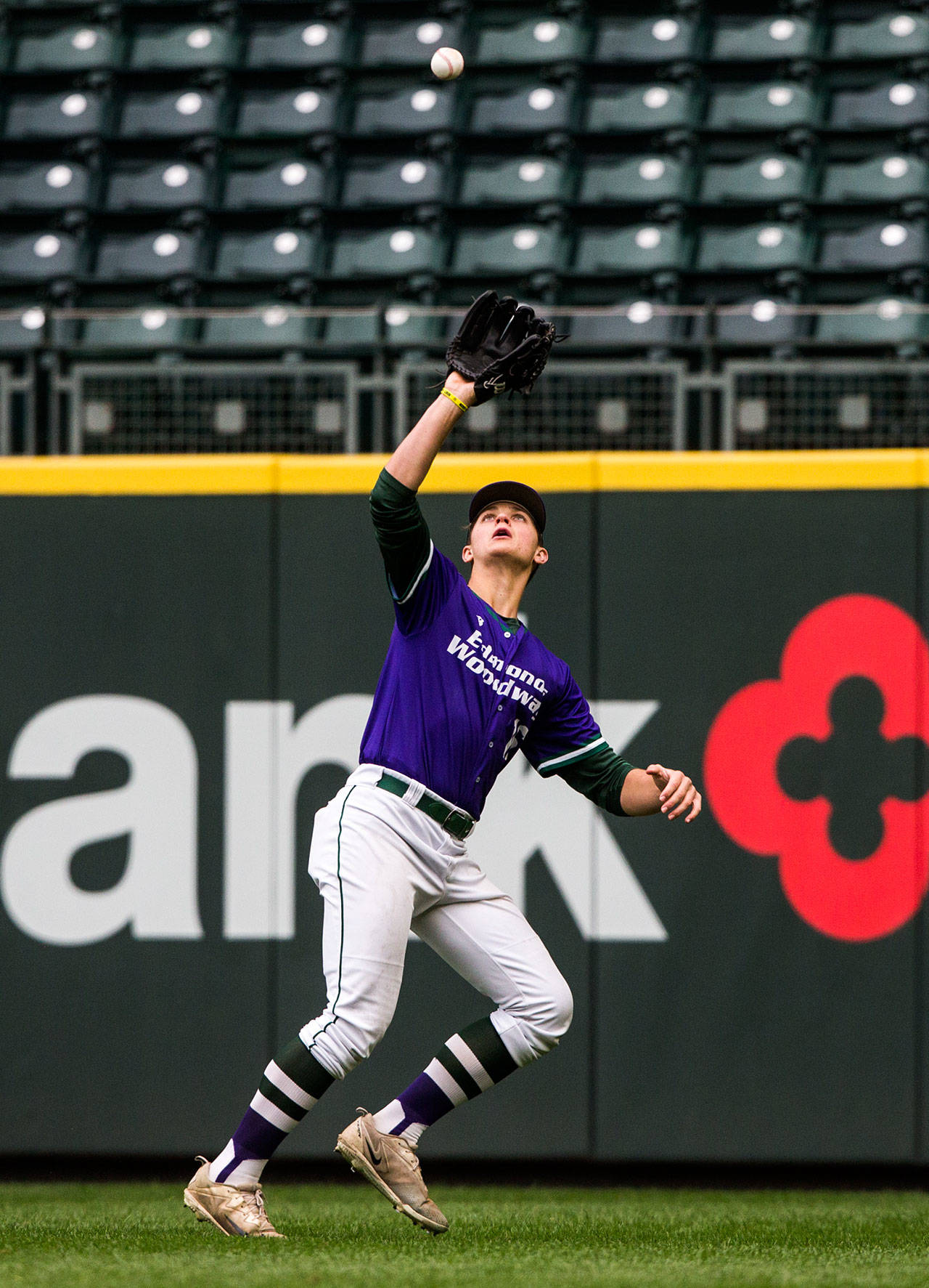 Edmonds-Woodway’s Thomas Blahous makes a catch in the spacious outfield of T-Mobile Park. (Olivia Vanni / The Herald)