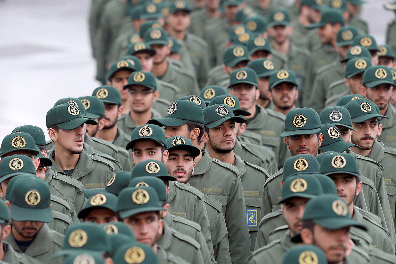 Iranian Revolutionary Guard members arrive for a ceremony celebrating the 40th anniversary of the Islamic Revolution, at the Azadi, or Freedom, Square, in Tehran, Iran, on Feb. 11. (AP Photo/Vahid Salemi)