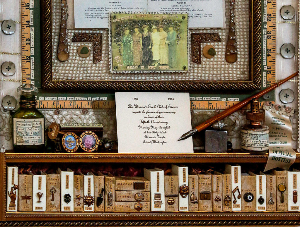 Local artist Lisa Spreacker created this mixed media artwork, “The Enduring Elegance of Womanly Friendship,” in honor of the long history of the Woman’s Book Club. On the second floor of the Everett Public Library, it hangs just left of the reference counter. (Dan Bates / The Herald)
