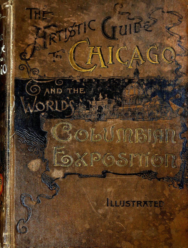 An old copy of “The Artistic Guide To Chicago and the World’s Columbian Exposition” was part of the Everett Public Library’s earliest collection. The library was founded by the Woman’s Book Club. (Dan Bates / The Herald)
