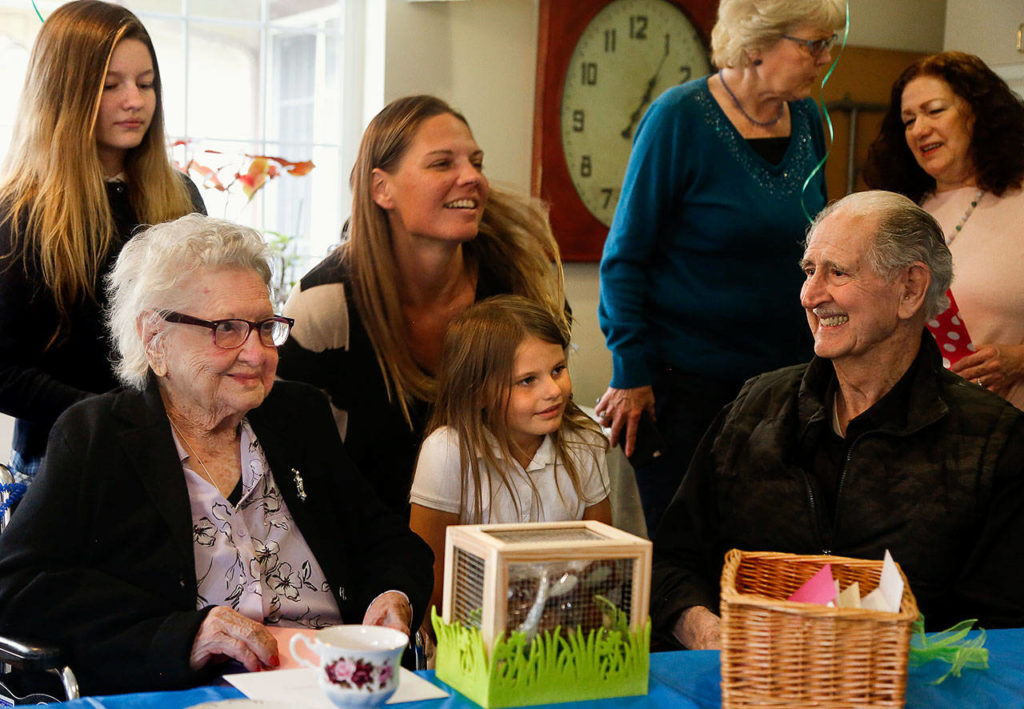 LaVerne Bunney on her 110th birthday with her son Bob Bunney, friends and other family. Bob will soon turn 90. (Dan Bates / The Herald)
