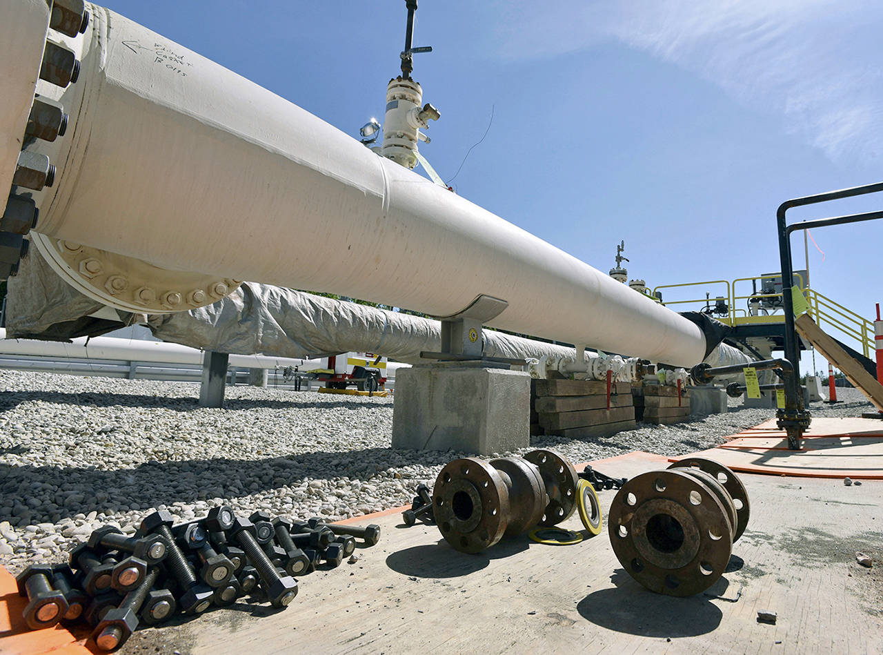 In this 2017 photo, nuts, bolts and fittings are ready to be added to the east leg of the pipeline near St. Ignace, Michigan, as Enbridge Inc., prepares to test the east and west sides of the Line 5 pipeline under the Straits of Mackinac in Mackinaw City, Michigan. (Dale G Young/Detroit News via AP, File)