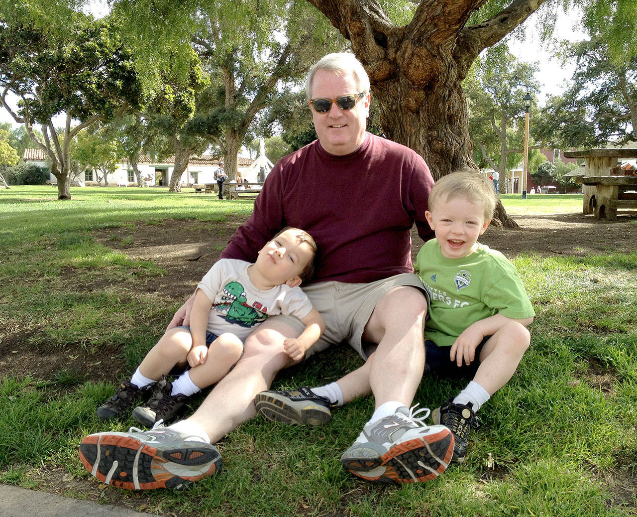 Much like journalism, parenthood reminds an editor that you rarely do everything perfectly. Neal Pattison, who retired Friday, sits with his sons Jules (left) and Chance. (Sarah Duran)