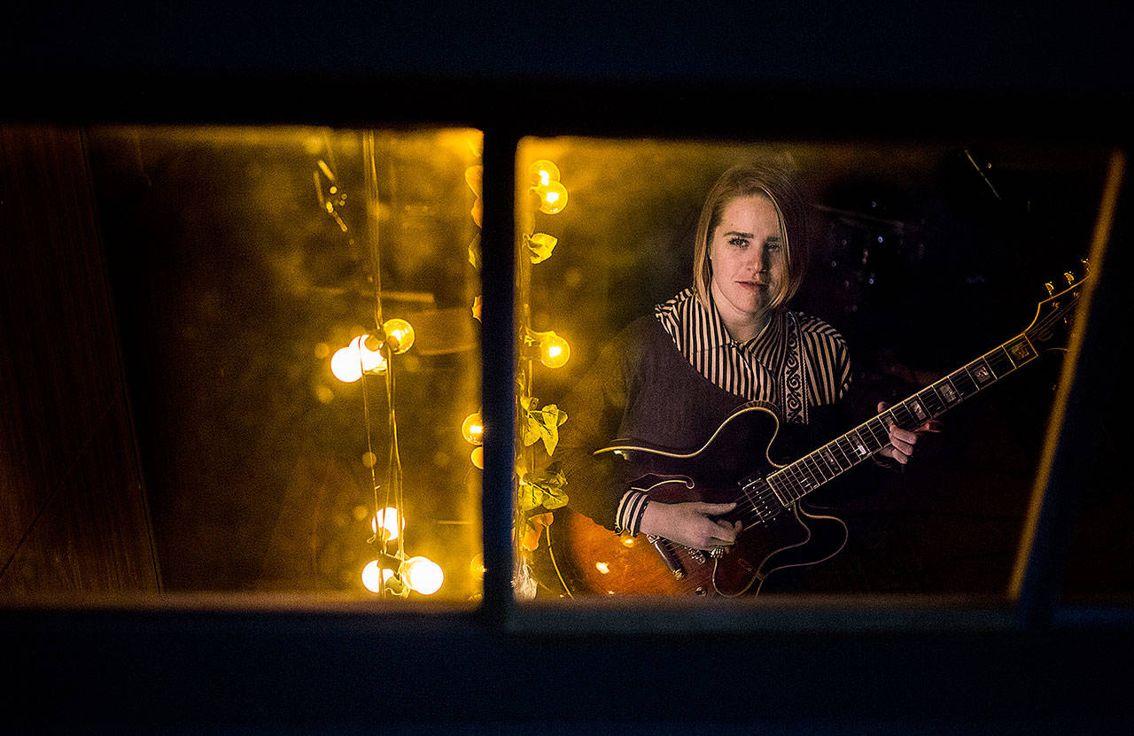 Sarah Feinberg rehearses in the basement of her Everett home. (Olivia Vanni/The Herald)